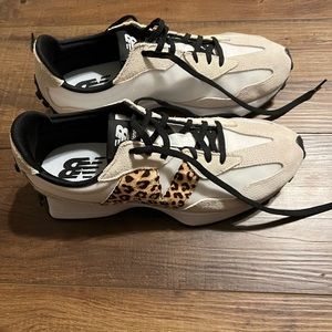 Women’s New Balance 327 tennis shoes. Worn only twice. Leopard “N”.